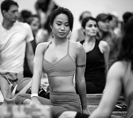 A yoga teacher preparing for class